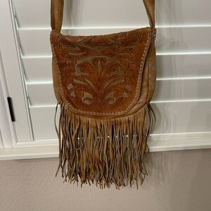 Brown Crossbody Bag with Intricate Design and Fringe